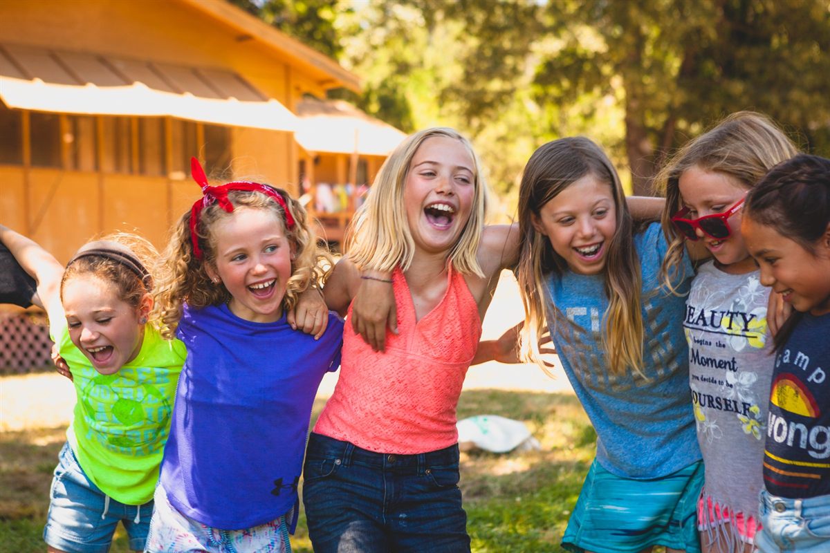 Children laughing together at a Jewish summer camp in San Diego